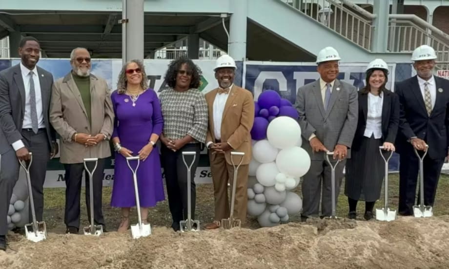 RTA and local officials in hard hats hold shovels at the Algiers Ferry Terminal groundbreaking.