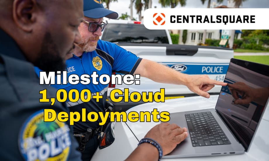 Two police officers working on a laptop computer, logo for CentralSquare, and headline Milestone: 1,000+ Cloud Deployments.