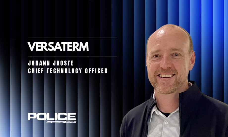 man in business attire against a black and blue corrugated background and headlines for Versaterm and the man's name and title.