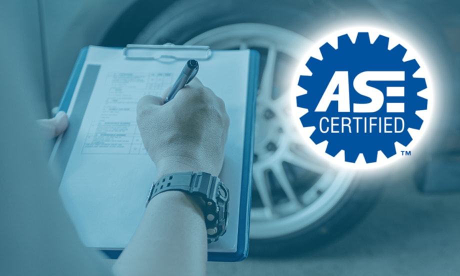 Technician writing on a clipboard in front of a vehicle wheel with ASE Certified logo displayed on the right side.