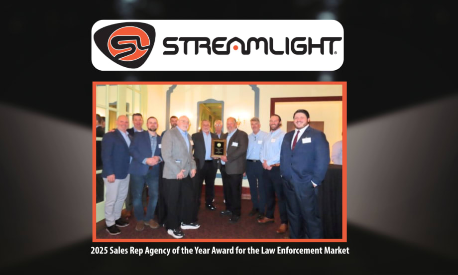 Image of a group of men in business attire receiving an award set against a black background and a Streamlight logo up top.