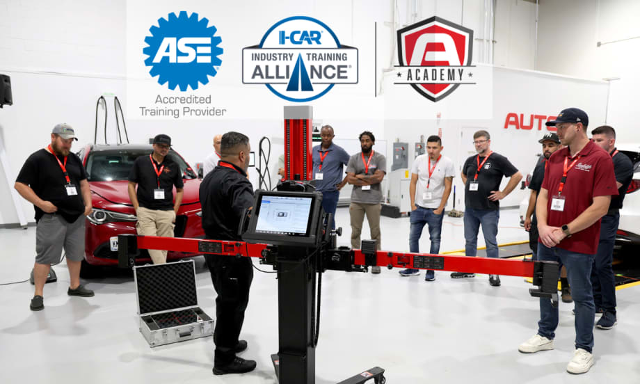 Group of automotive technicians in a circle learning during a training class, with three logos across the top of the image.
