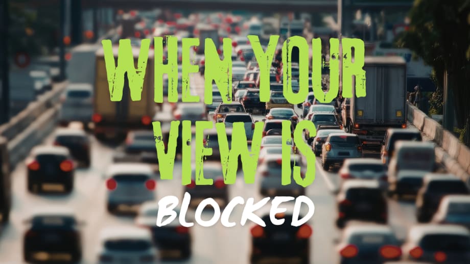 Heavy traffic with cars and trucks blocking visibility, illustrating how limited sightlines can impact driver awareness and safe decision-making on the road.