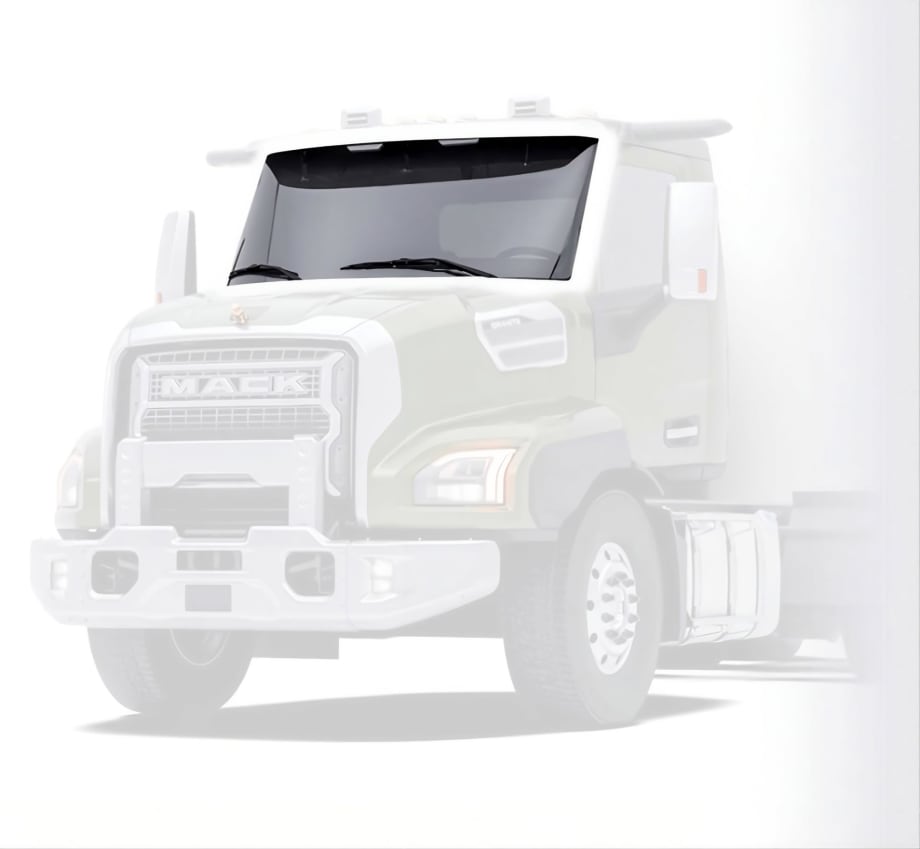 Front view of a Mack Granite heavy-duty truck featuring the new ImpactShield windshield with Corning Fusion5 Glass technology.