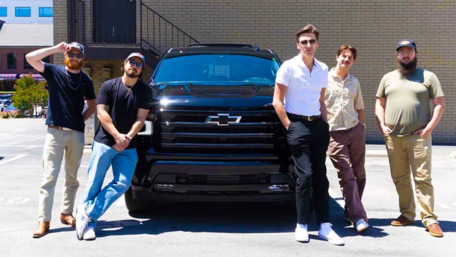 The Red Clay Strays pose with a Chevrolet Silverado, one of several vehicles featured in the revived "Heartbeat of America" campaign highlighting the brand's connection to hardworking Americans.