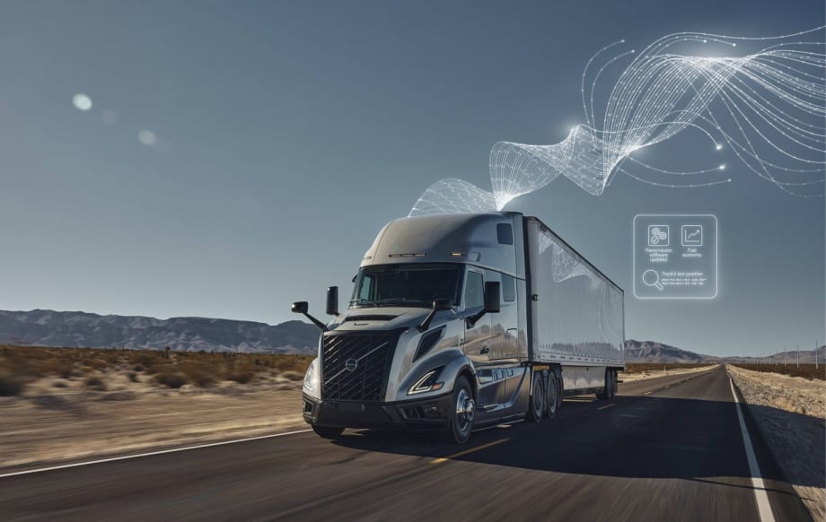 Photo of Volvo VNL truck on highway with illustration of software over the air updates