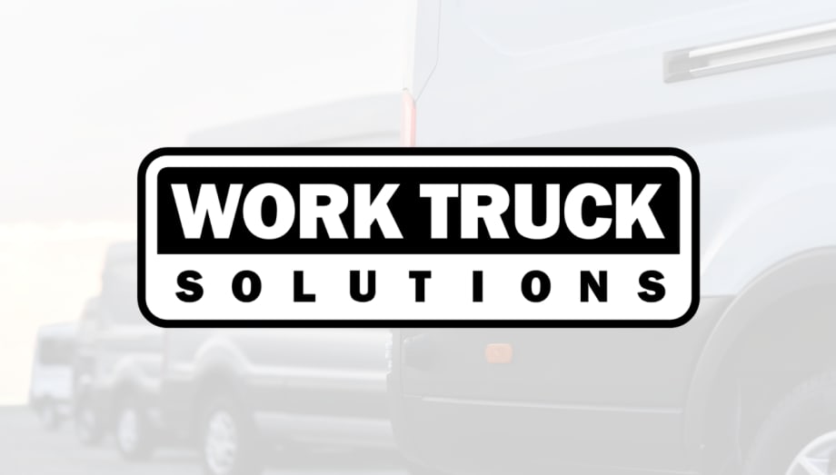 Work Truck Solutions logo centered over a faded background featuring commercial work trucks.