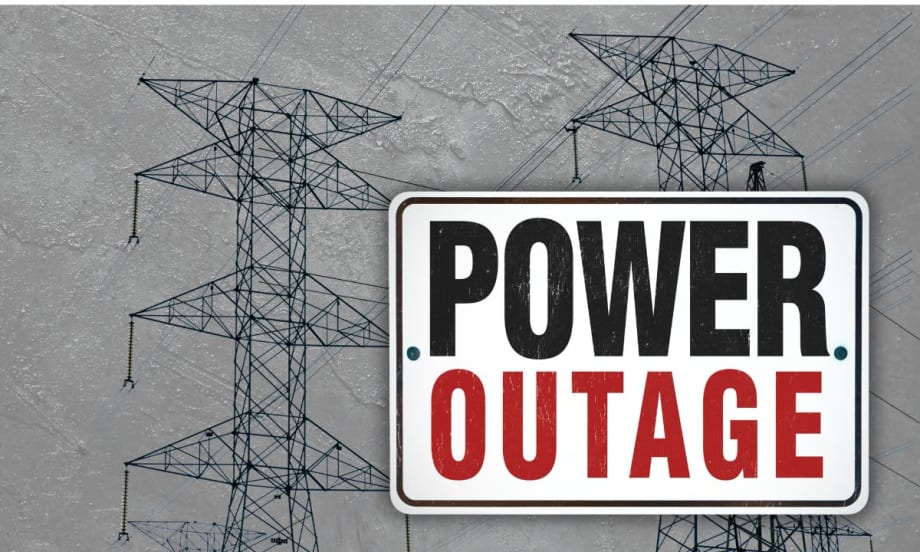 Power lines on a stormy day with the words POWER OUTAGE