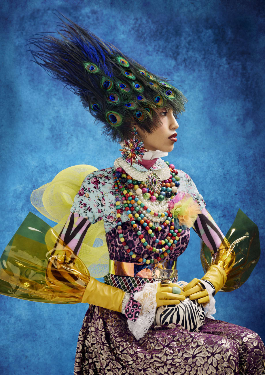 A woman in colorful hair and clothes.