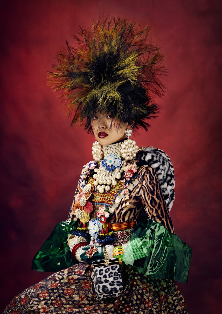 A woman in colorful hair and clothes.