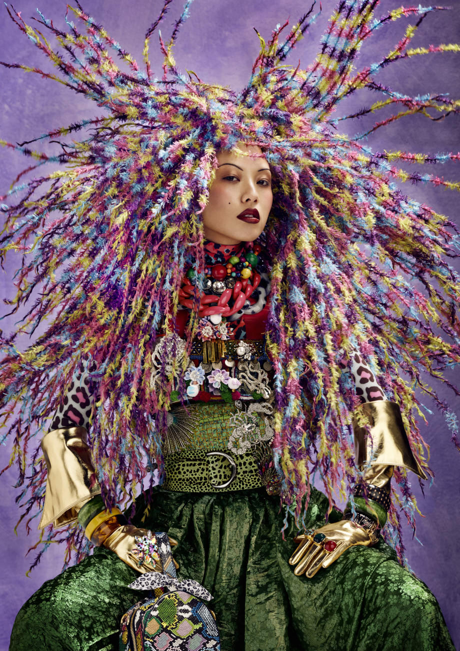 A woman in colorful hair and clothes.