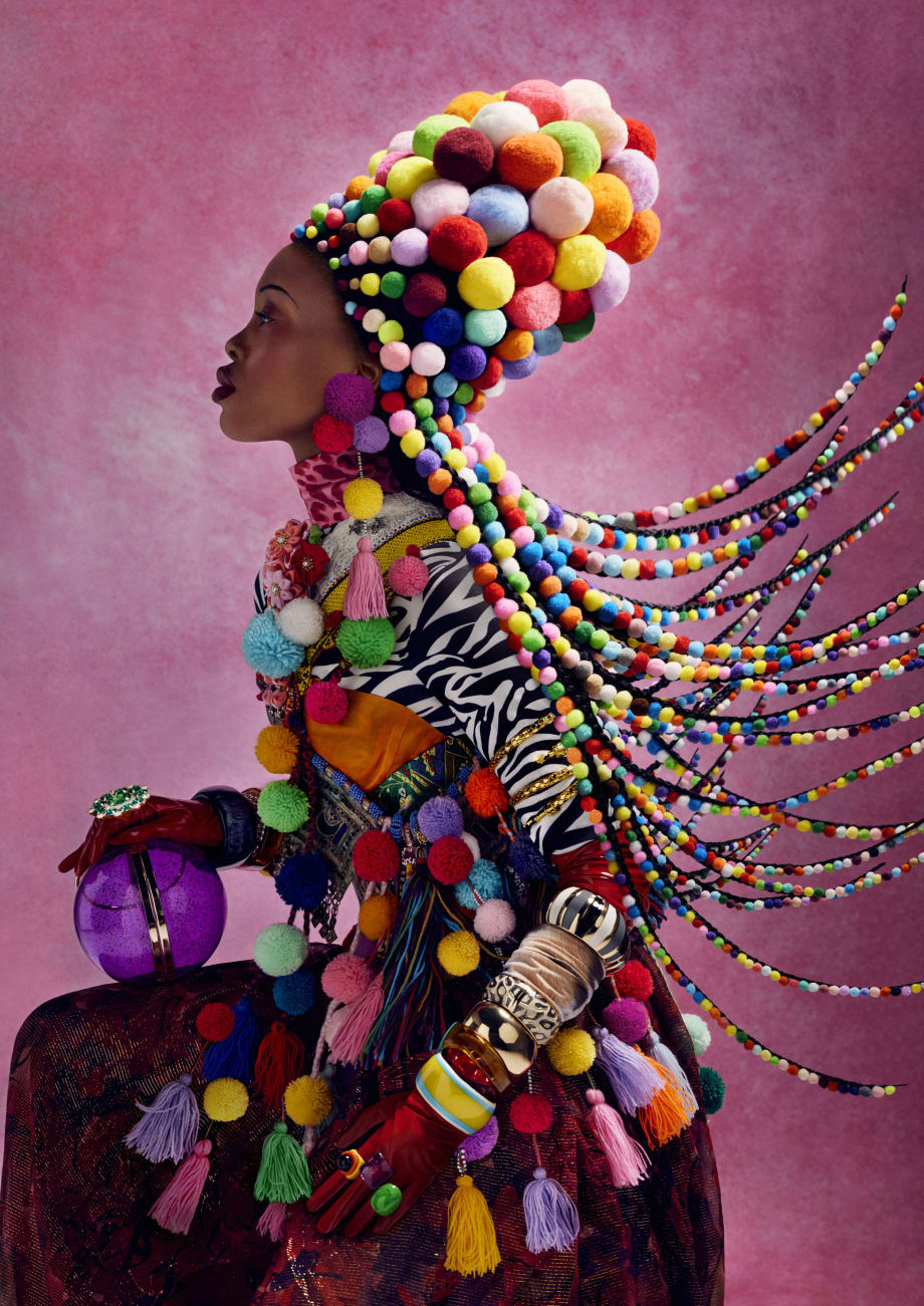 A woman in colorful hair and clothes.