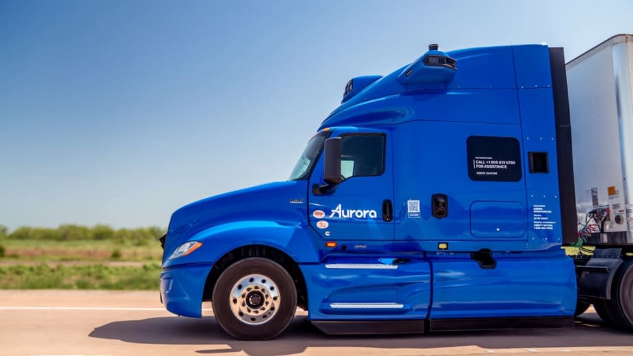 Blue International LT truck with Aurora Driver autonomous hardware viewed from the side