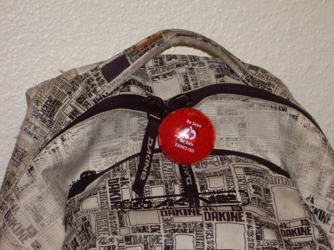 Students wear LED lights for morning pick-up