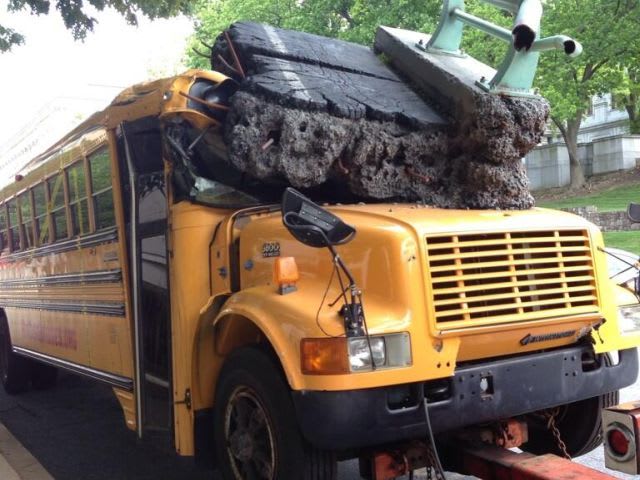 Smashed school bus returns in Michigan campaign