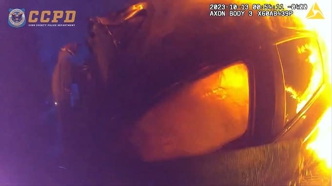 Video: Georgia Officer Saves Woman from Burning Car