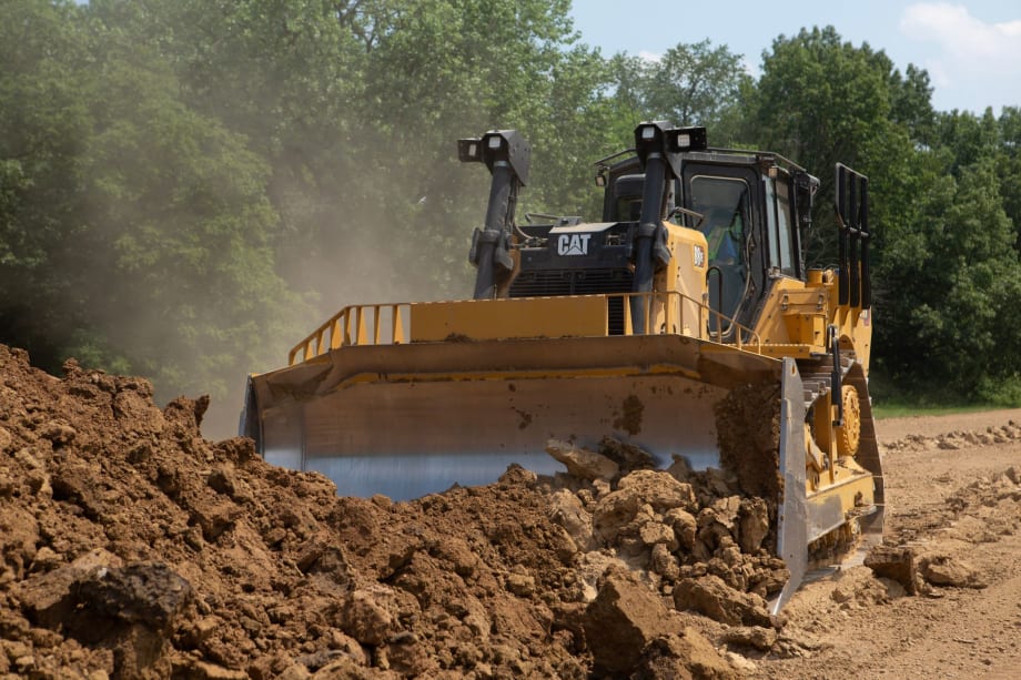 Caterpillar Cat D8 XE dozer operating on a dirt worksite, part of the company’s next-generation lineup featuring Electric Drive technology to improve efficiency and performance.