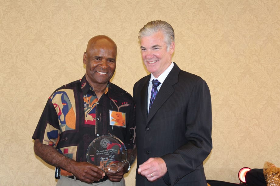 Bus driver honored for role in school success