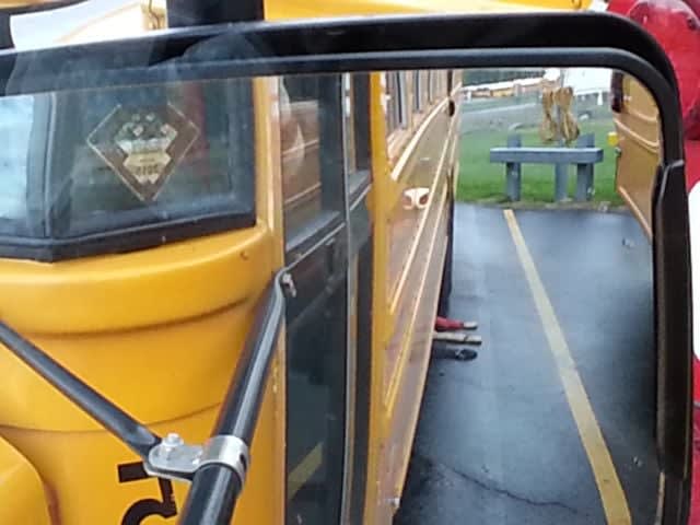 Prop arms help train drivers to check mirrors thoroughly