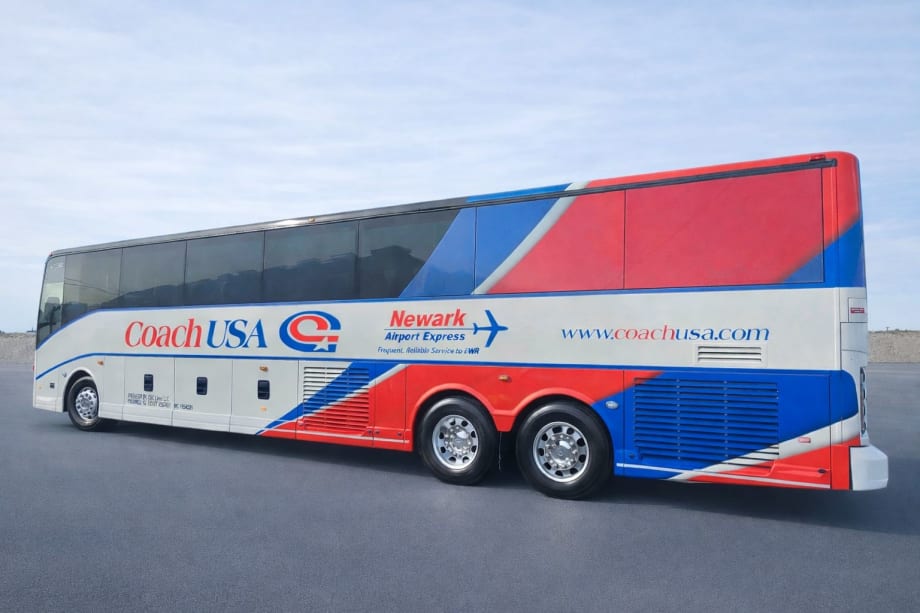 A Coach USA vehicle wrapped for Newark International Airport service.