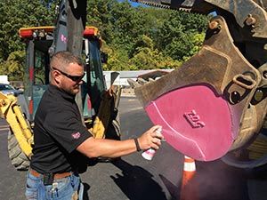 Columbia Gas of Ohio Paints Bucket Trucks Pink