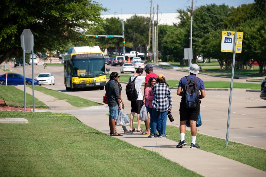 DART bus approaching waiting passengers