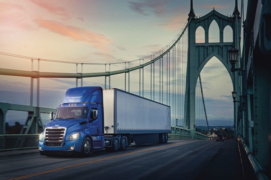 Illustration of day cab tractor-trailer crossing bridge