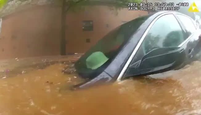 Atlanta Officer Teams Up with Firefighter to Rescue Man from Flooded Car