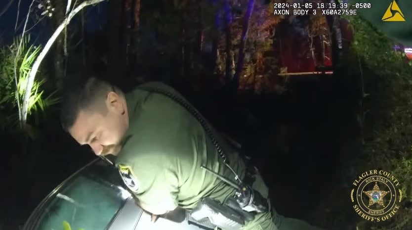 Video: Florida Deputies and Firefighters Rescue Child and Adult from Submerged Vehicle