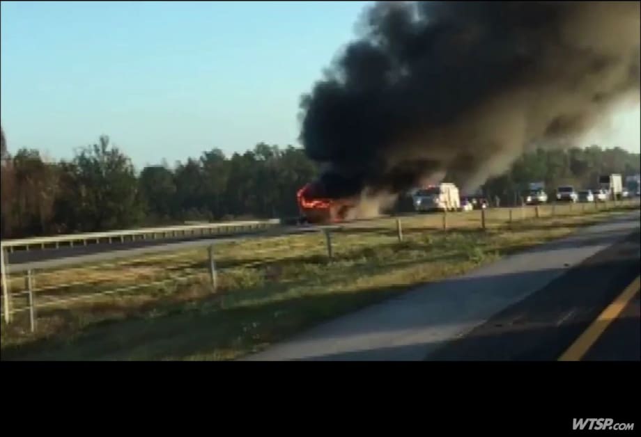 Driver rescues nearly 40 children from burning bus
