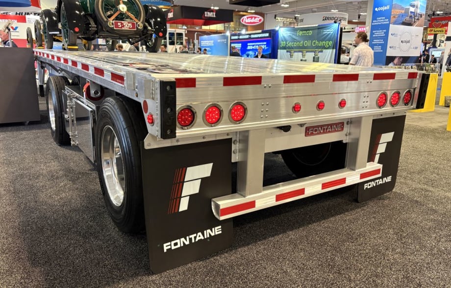 Photo of back of aluminum flatbed trailer on show floor