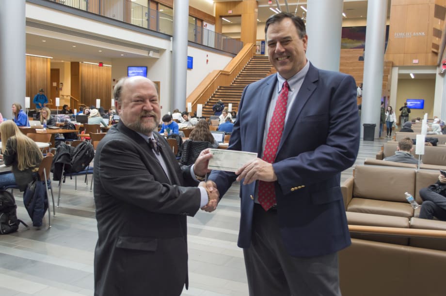 Fleet Manager of Year Survant Presents Scholarship Check