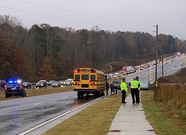 Car Strikes Man, 2 Girls Trying to Board School Bus
