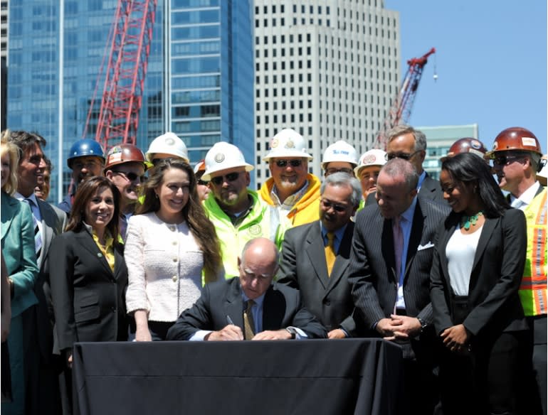 Calif. Gov. signs high-speed rail bill, calls out critics