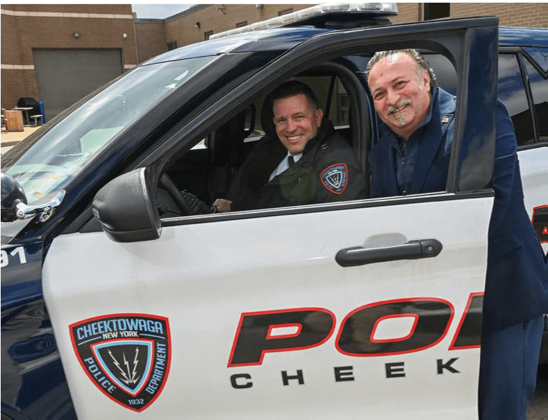 Officer smiling with an executive