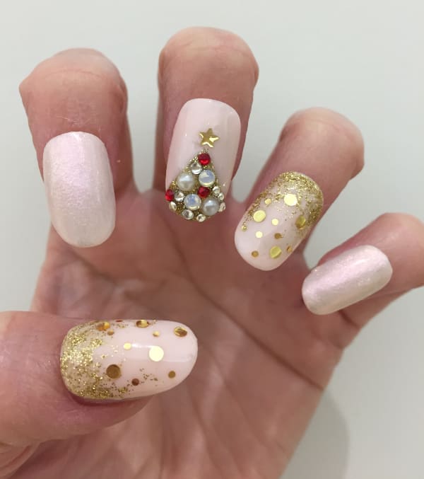 Feminine and Fun Christmas Tree Nail Art