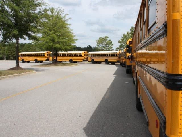 Alabama district delays school bus fee plan by 1 year
