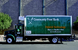 Rush Truck Center Delivers Hybrid Truck to Food Bank