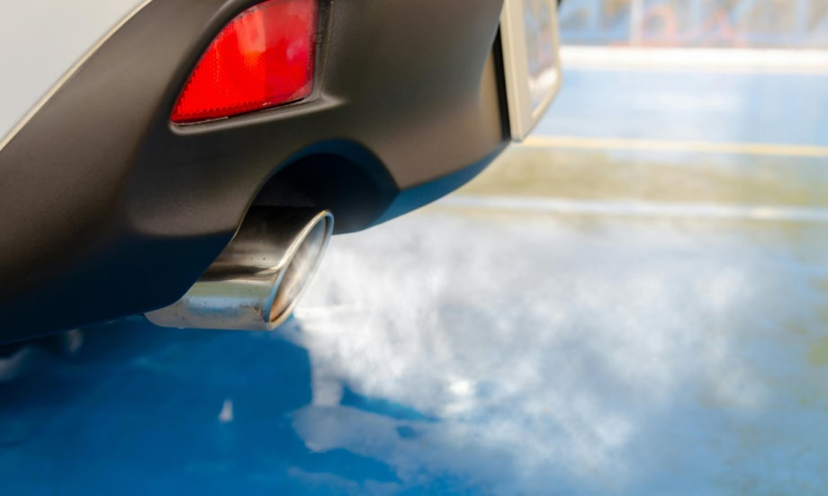 Car exhaust pipe blowing exhaust.