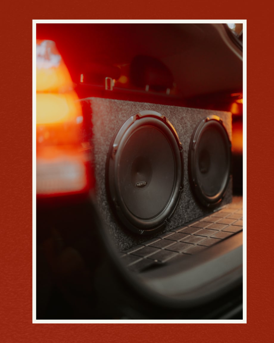 Subwoofer in trunk of car.