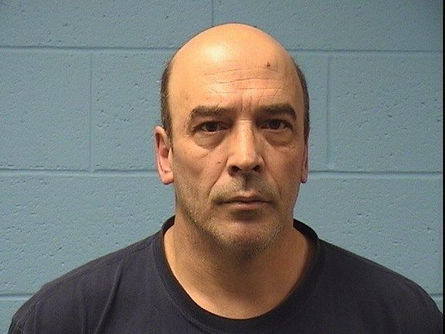 Man accused of attacking school bus that woke him