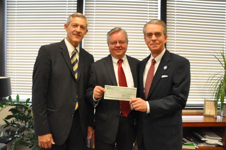Sims Donates $5K Scholarship Check to LDS Business College
