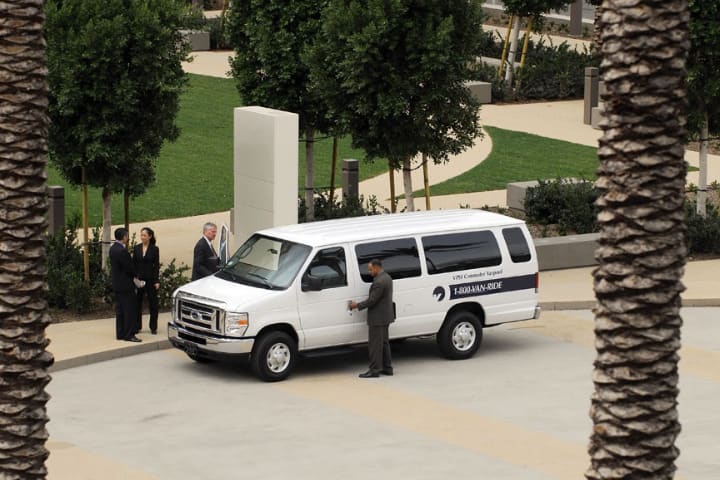 Ford E-Series Vans Cut Fuel Costs, C02 Emissions In Unique Way - Van Pooling Commuters