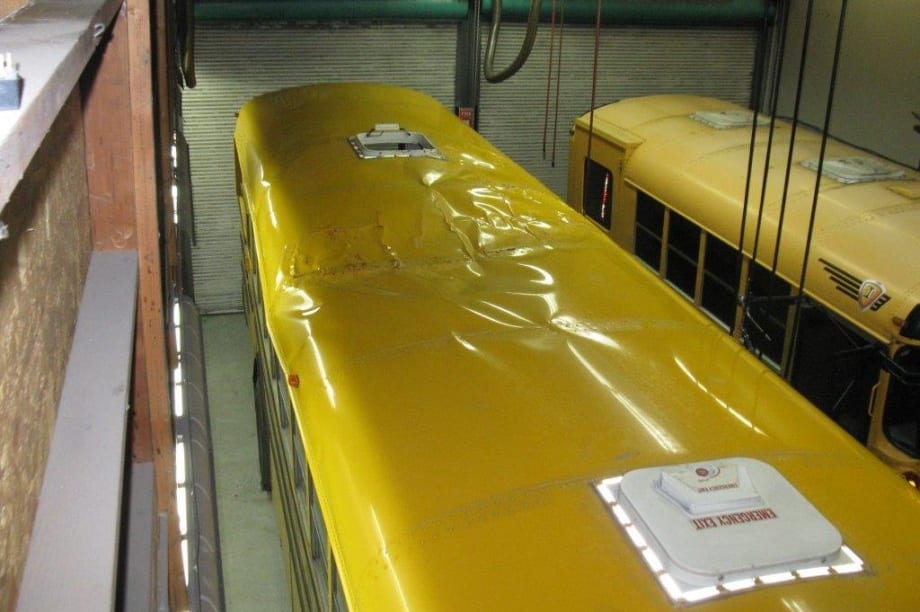 Tree falls on bus in storm, no one hurt