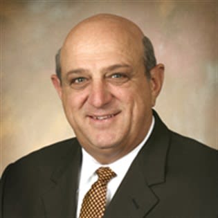 Cooper Sues Apollo for Dragging its Feet