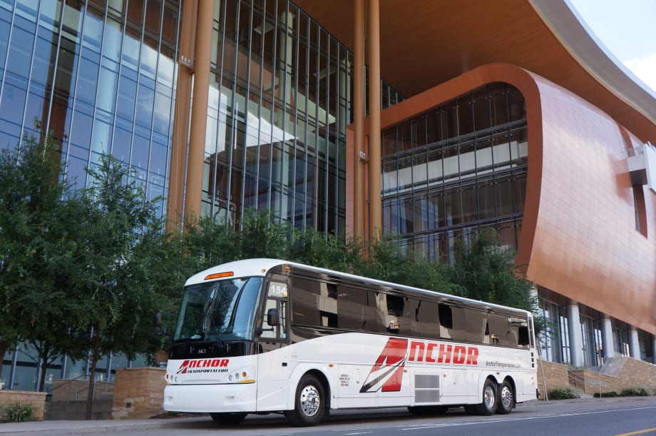 MCI delivers 5 J4500s, 8 D4505s To Village Tours & Travel, Anchor Transportation