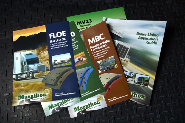 Friction material guides