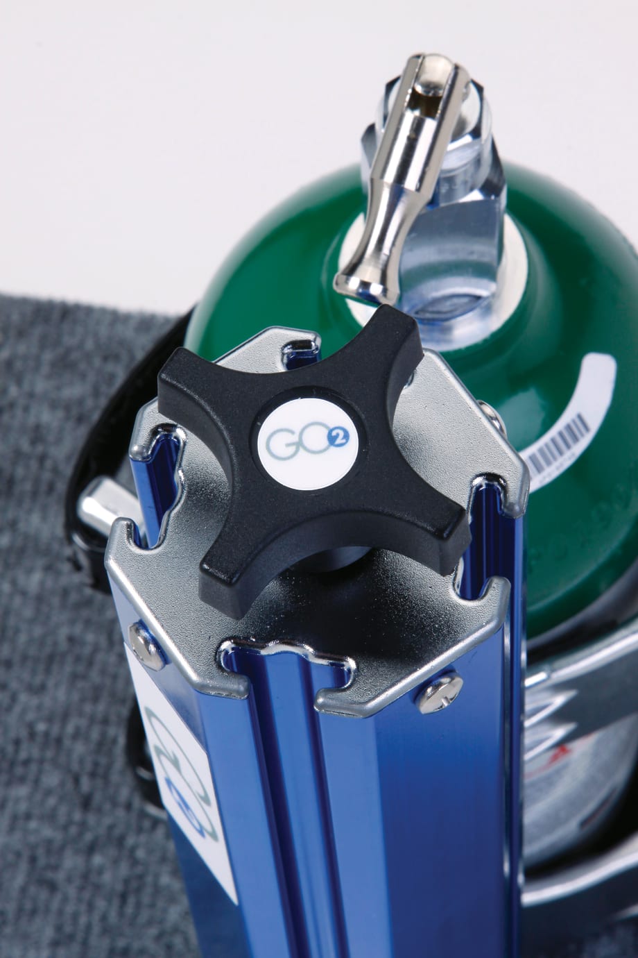 Q'Straint releases oxygen tank securement