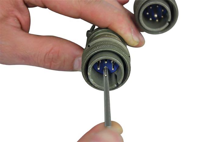 Set of Tools Cleans Male Pins on Terminals