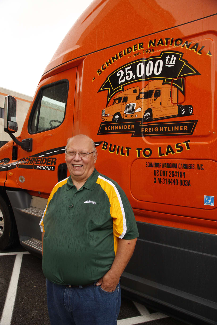 Freightliner Execs Deliver 25,000th Big Orange Truck to Schneider National